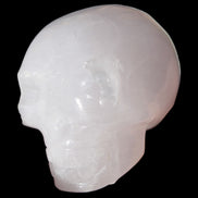 Mangano Calcite skull 40*55*45mm  160/161g in sunlight - Rocks and Things Store