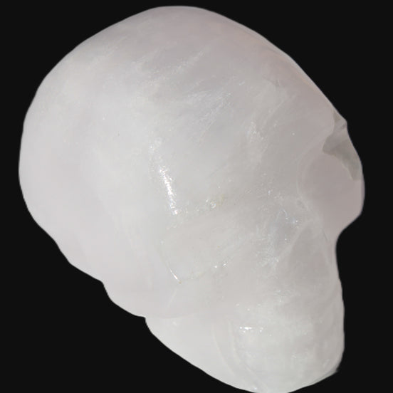 Mangano Calcite skull 40*55*45mm  160/161g in sunlight - Rocks and Things Store