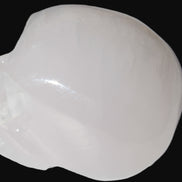 Mangano Calcite skull 40*55*45mm  160/161g in sunlight - Rocks and Things Store