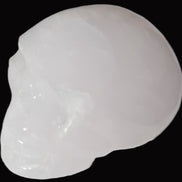 Mangano Calcite skull 40*55*45mm  160/161g in sunlight - Rocks and Things Store