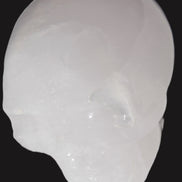 Mangano Calcite skull 40*55*45mm  160/161g in sunlight - Rocks and Things Store