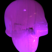 Mangano banded Calcite skull 43*44*48mm 161.5g in UV light - Rocks and Things Store