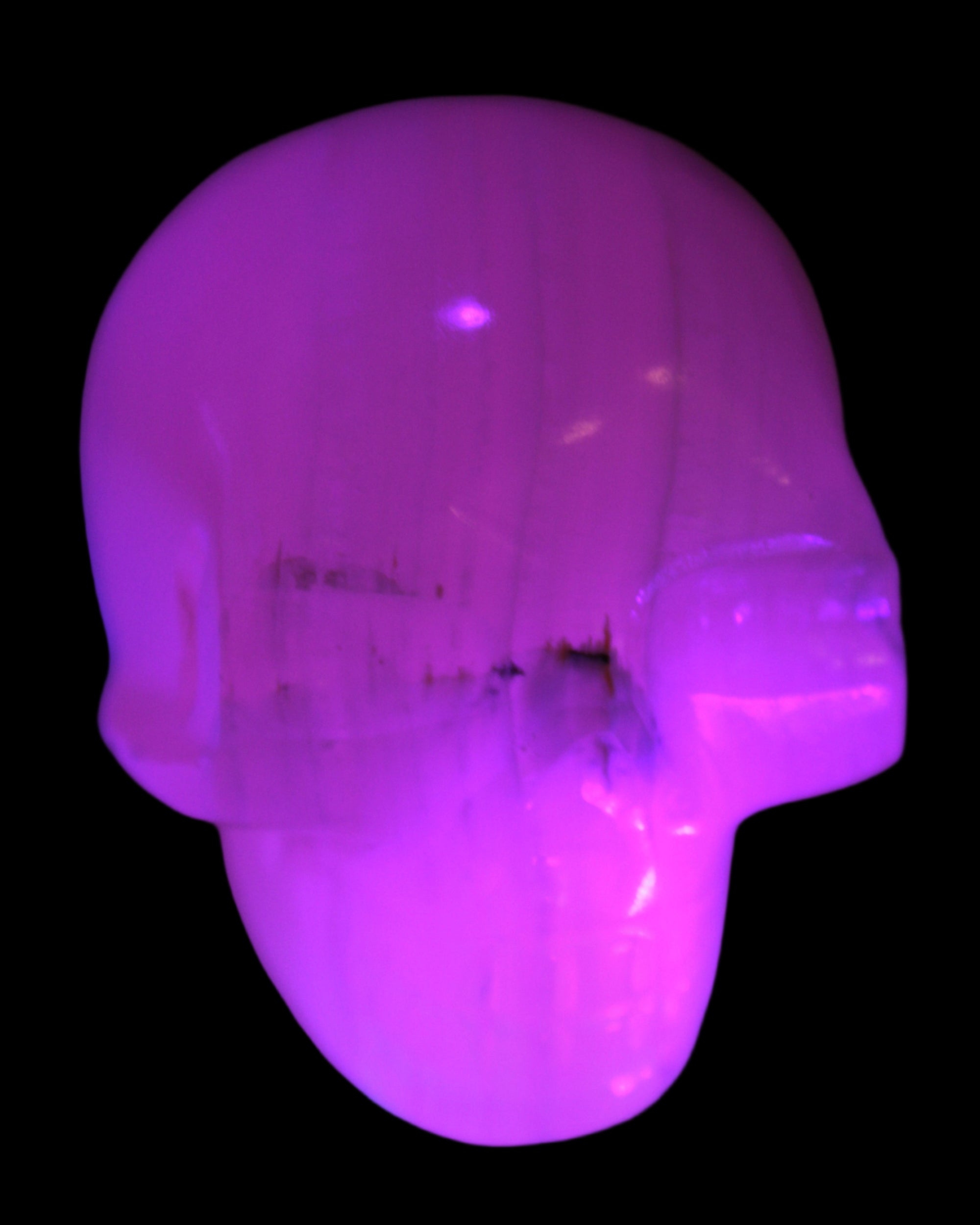 Mangano banded Calcite skull 43*44*48mm 161.5g in UV light - Rocks and Things Store