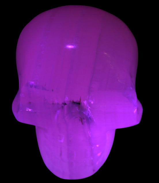 Mangano banded Calcite skull 43*44*48mm 161.5g in UV light - Rocks and Things Store