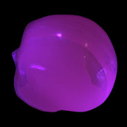 Mangano banded Calcite skull 43*44*48mm 161.5g in UV light - Rocks and Things Store