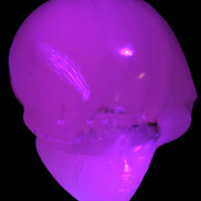 Mangano banded Calcite skull 43*44*48mm 161.5g in UV light - Rocks and Things Store