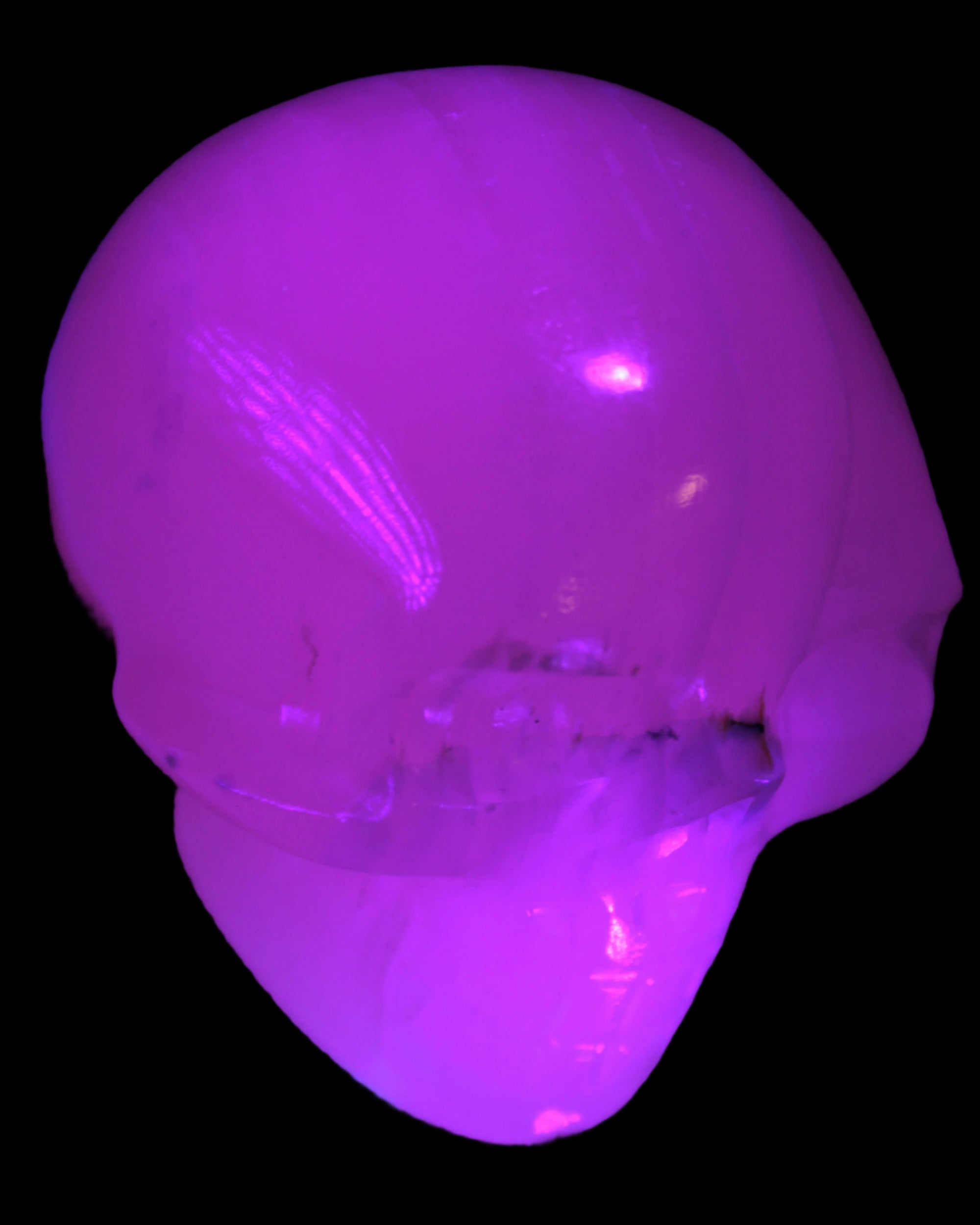 Mangano banded Calcite skull 43*44*48mm 161.5g in UV light - Rocks and Things Store