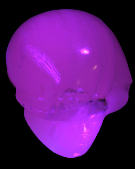 Mangano banded Calcite skull 43*44*48mm 161.5g in UV light - Rocks and Things Store