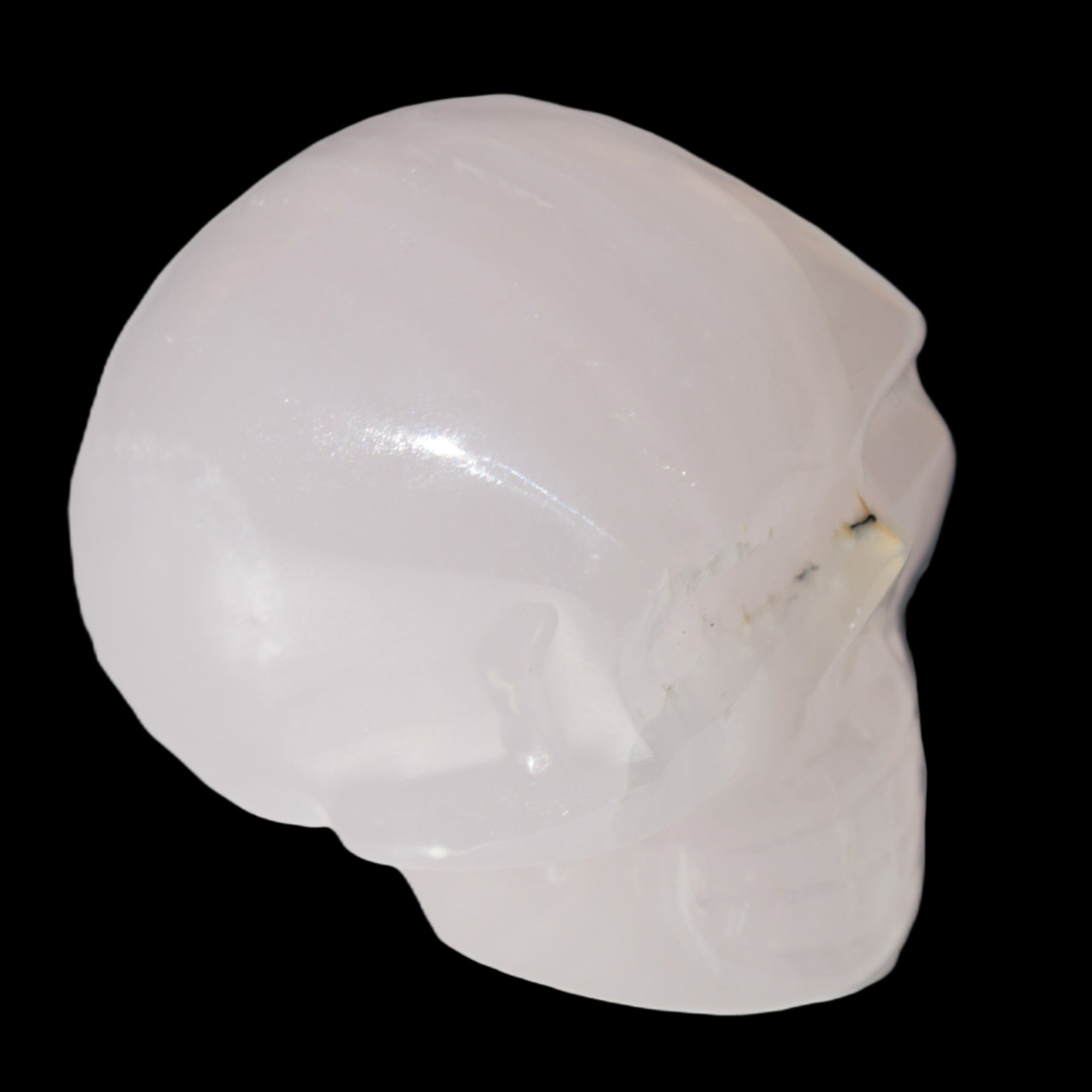 Mangano banded Calcite skull 43*44*48mm 161.5g in sunlight - Rocks and Things Store