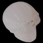 Mangano banded Calcite skull 43*44*48mm 161.5g in sunlight - Rocks and Things Store