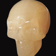 Honey Calcite skull 40*58*56mm 182-194g in sunlight - Rocks and Things Store