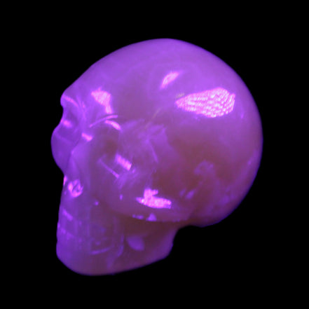Honey Calcite skull 40*58*56mm approx., 189g in UV light - Rocks and Things Store