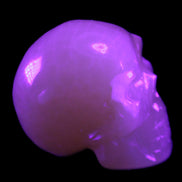 Honey Calcite skull 40*58*56mm approx., 189g in UV light - Rocks and Things Store