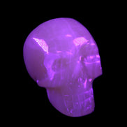 Honey Calcite skull 40*58*56mm approx., 189g in UV light - Rocks and Things Store