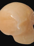 Honey Calcite skull 40*58*56mm 182-194g in sunlight - Rocks and Things Store