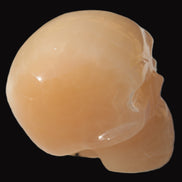 Honey Calcite skull 40*58*56mm 182-194g in sunlight - Rocks and Things Store