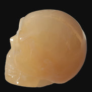 Honey Calcite skull 40*58*56mm 182-194g in sunlight - Rocks and Things Store