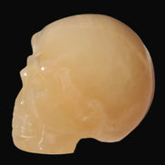 Honey Calcite skull 40*58*56mm 182-194g in sunlight - Rocks and Things Store