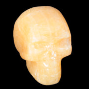 Honey Calcite skull 40*58*56mm approx., 182.6-194.6g in sunlight  Rocks and Things Store