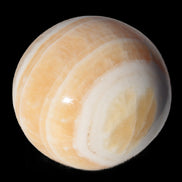 Yellow Calcite sphere 45mm 166g in sunshine - Rocks and Things Store