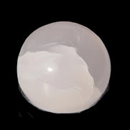 Mangano Calcite sphere 45mm 125g in sunlight - Rocks and Things Store