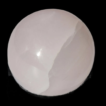 Mangano Calcite sphere 45mm 125g in sunlight - Rocks and Things Store