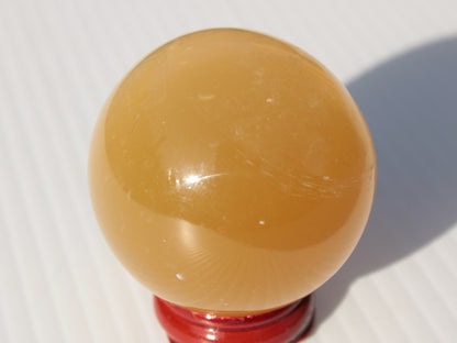 Honey Calcite sphere 47mm 162g Rocks and Things