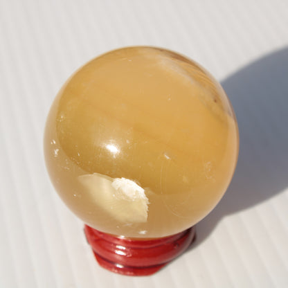 Honey Calcite sphere 47mm 162g Rocks and Things