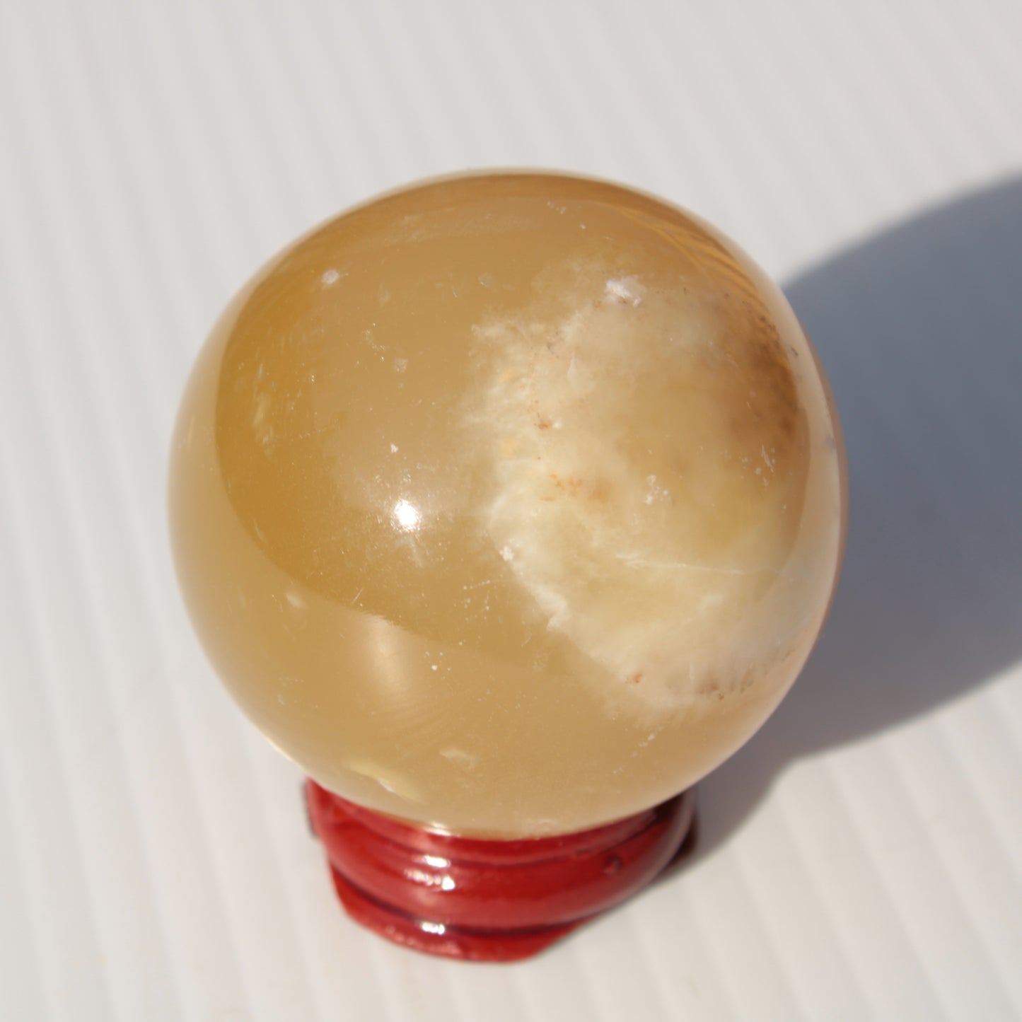 Honey Calcite sphere 47mm 162g Rocks and Things