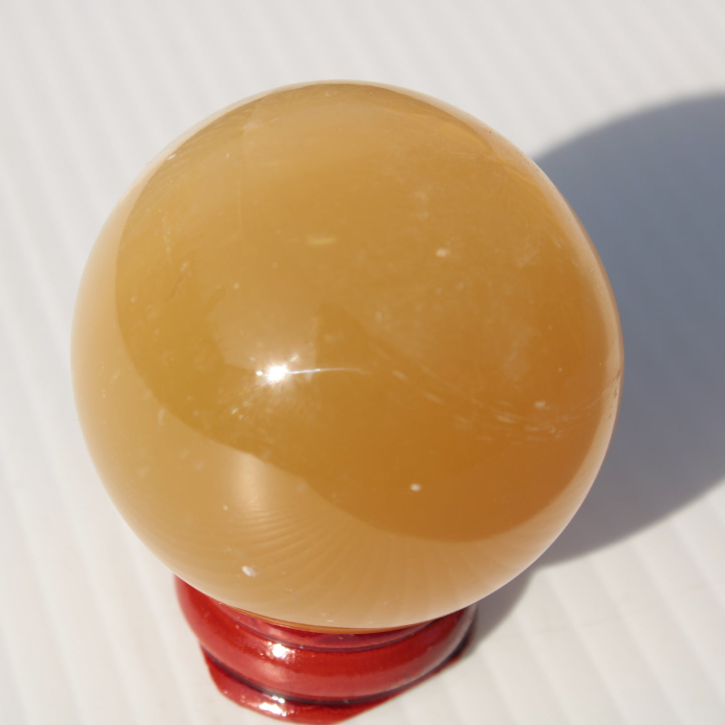 Honey Calcite sphere 47mm 162g Rocks and Things