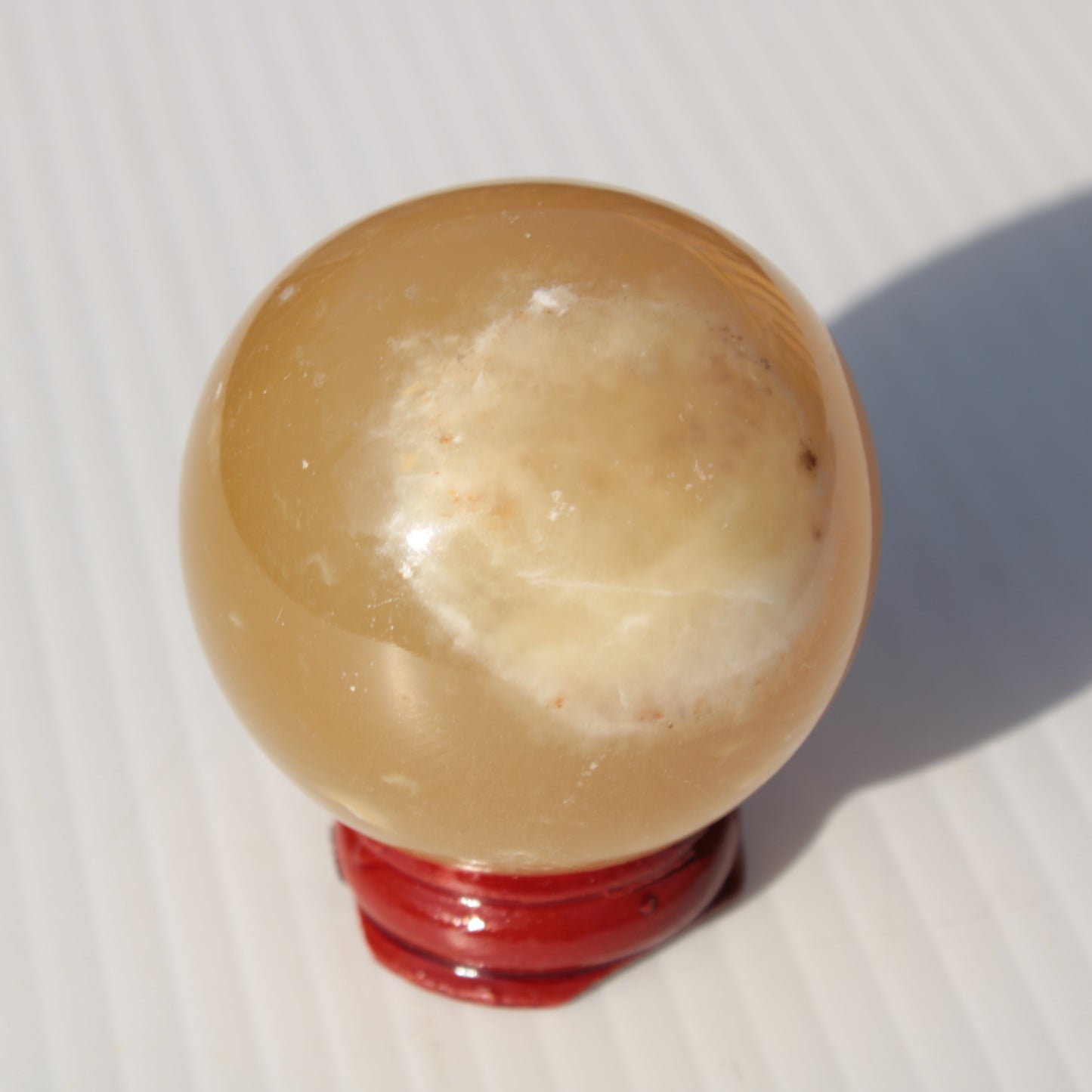 Honey Calcite sphere 47mm 162g Rocks and Things