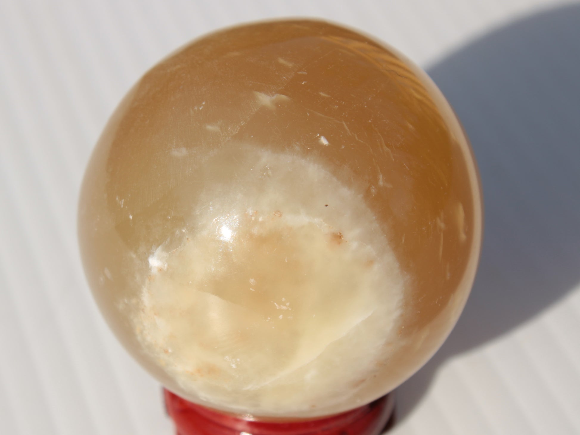 Honey Calcite sphere 47mm 162g Rocks and Things