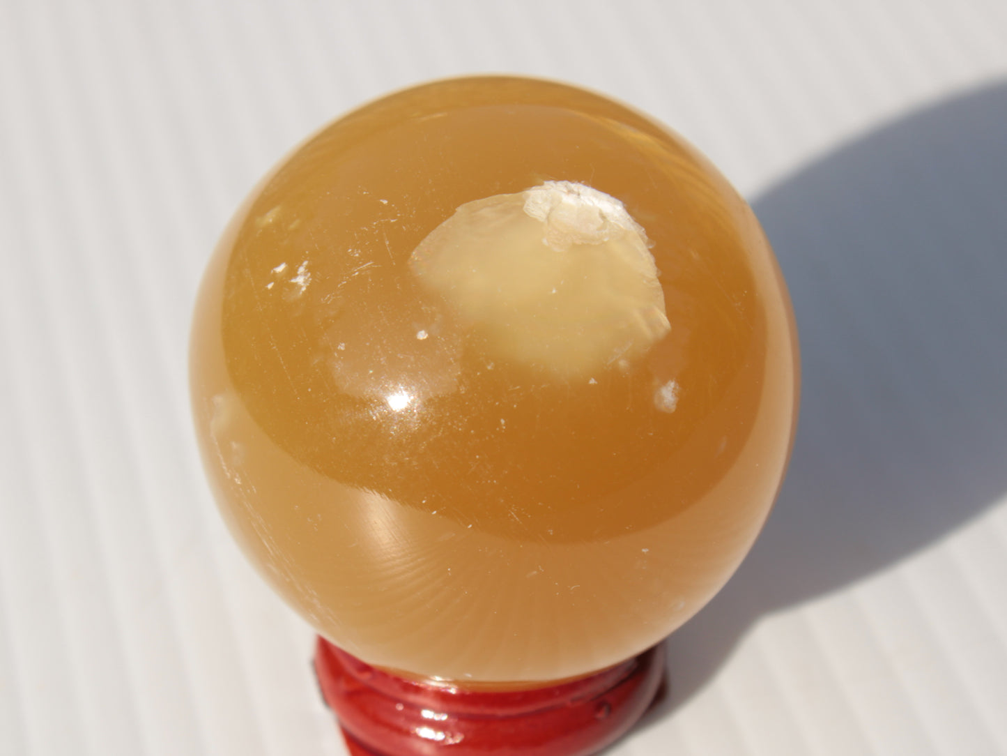 Honey Calcite sphere 47mm 162g Rocks and Things