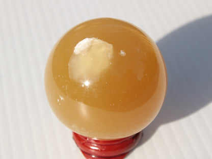 Honey Calcite sphere 47mm 162g Rocks and Things