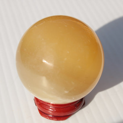 Honey Calcite sphere 47mm 162g Rocks and Things