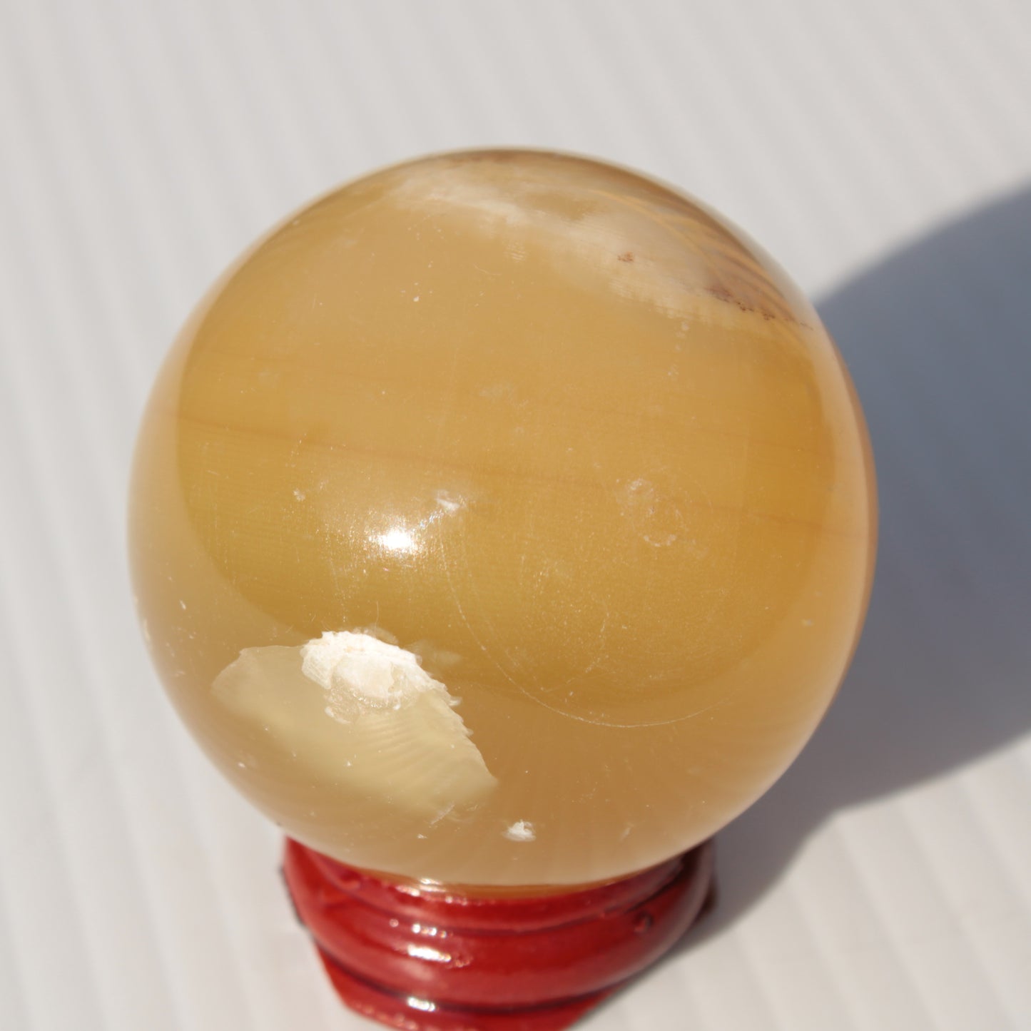 Honey Calcite sphere 47mm 162g Rocks and Things