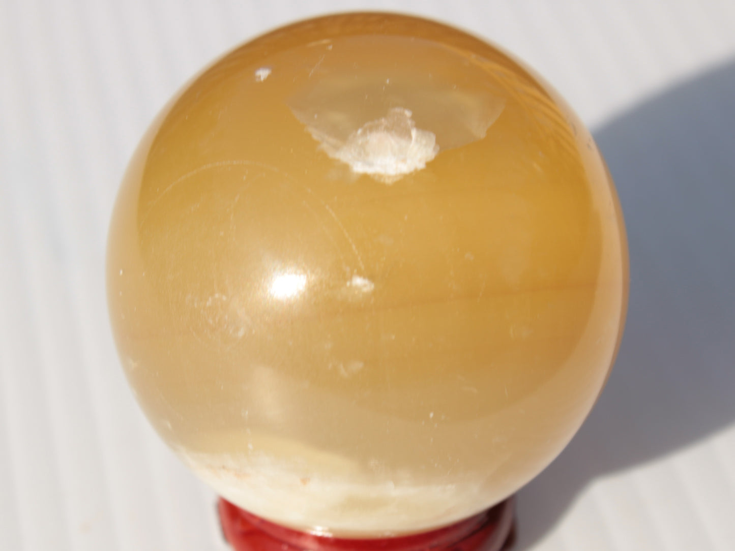 Honey Calcite sphere 47mm 162g Rocks and Things