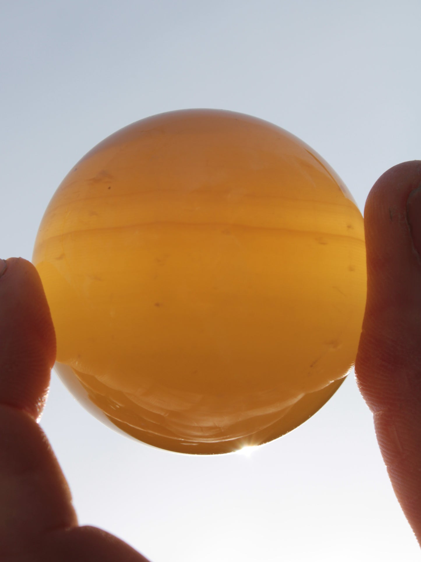 Honey Calcite sphere 47mm 162g Rocks and Things