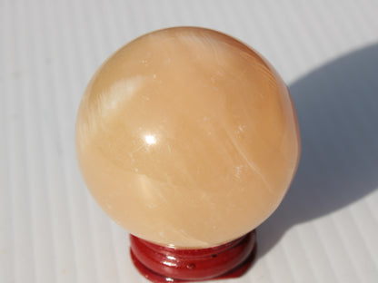 Honey Calcite sphere 49mm 167g Rocks and Things