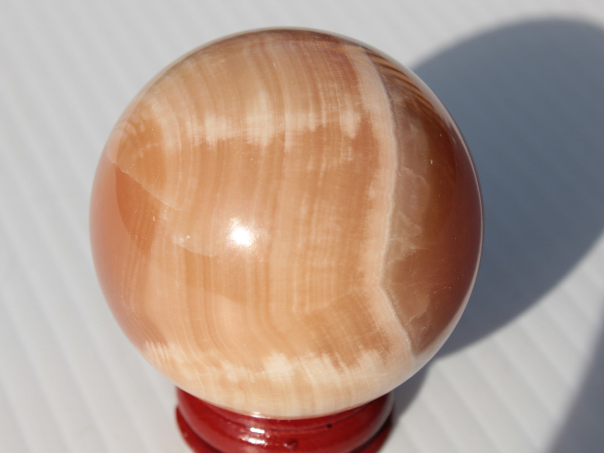 Honey Calcite sphere 49mm 167g Rocks and Things