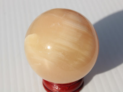 Honey Calcite sphere 49mm 167g Rocks and Things