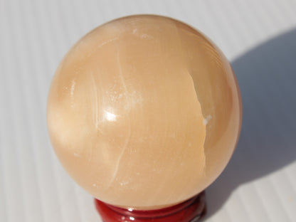 Honey Calcite sphere 49mm 167g Rocks and Things