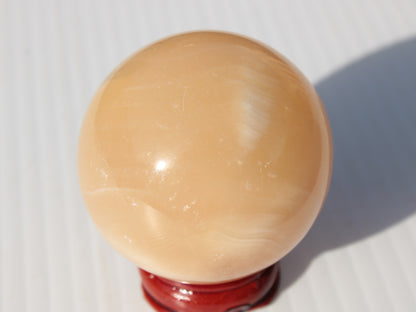 Honey Calcite sphere 49mm 167g Rocks and Things