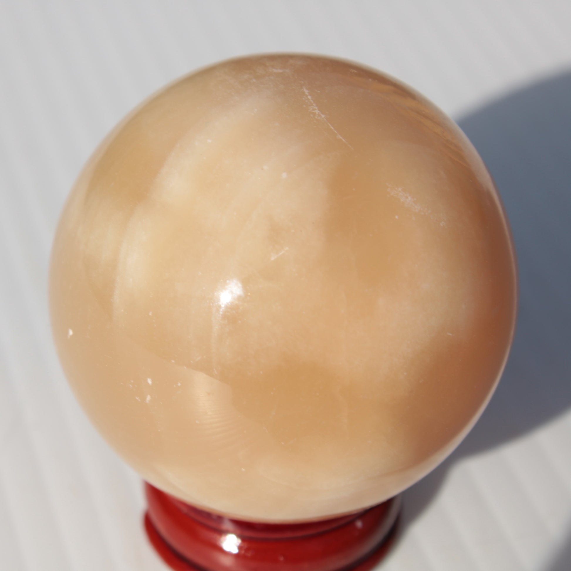 Honey Calcite sphere 49mm 167g Rocks and Things