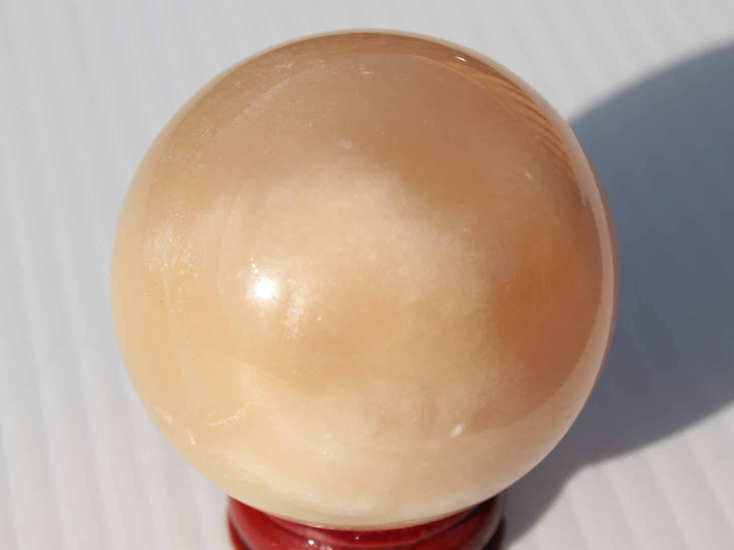 Honey Calcite sphere 49mm 167g Rocks and Things