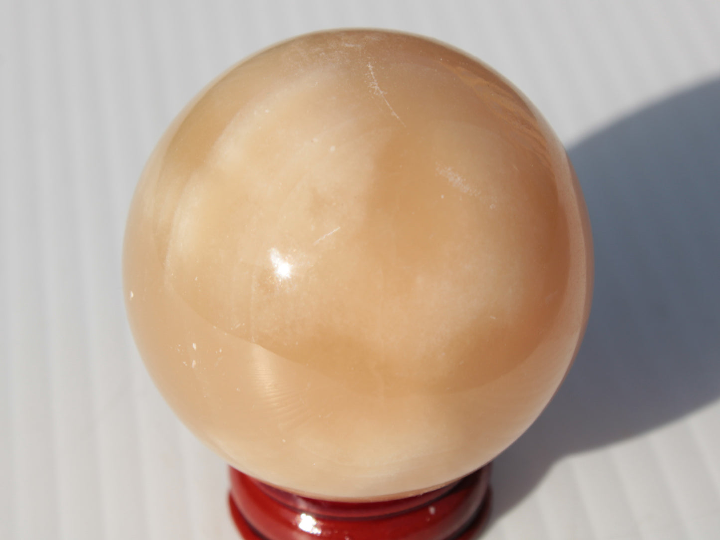 Honey Calcite sphere 49mm 167g Rocks and Things