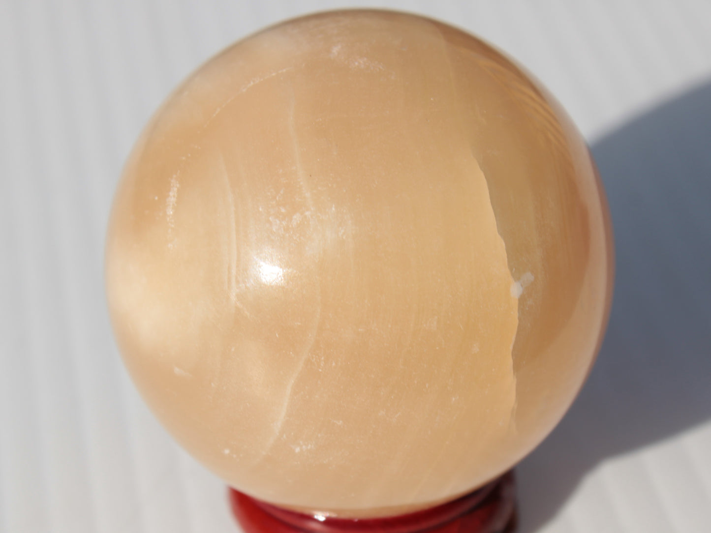 Honey Calcite sphere 49mm 167g Rocks and Things