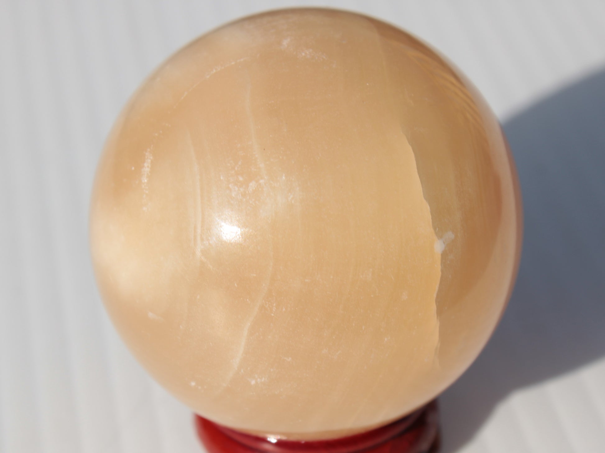 Honey Calcite sphere 49mm 167g Rocks and Things