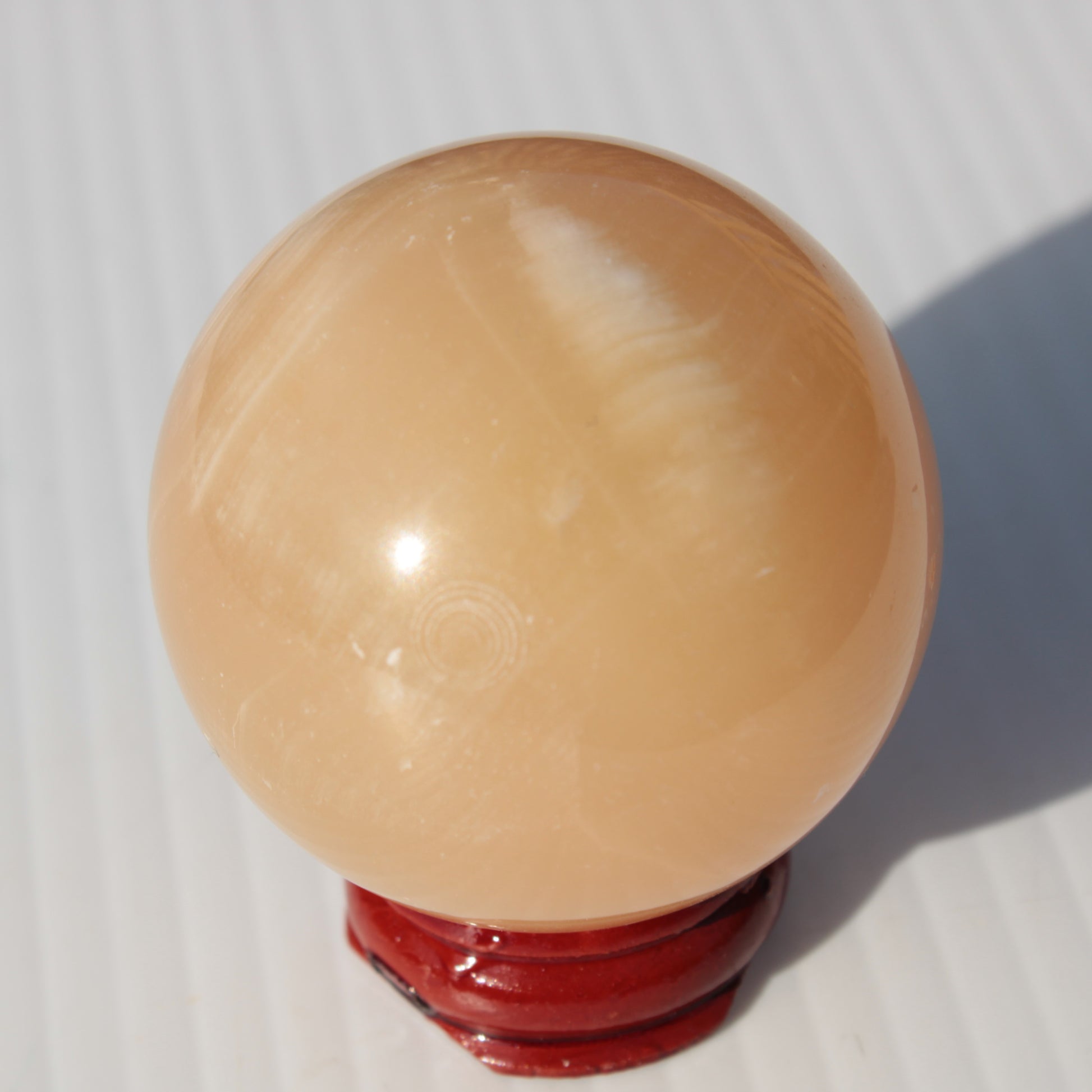 Honey Calcite sphere 49mm 167g Rocks and Things