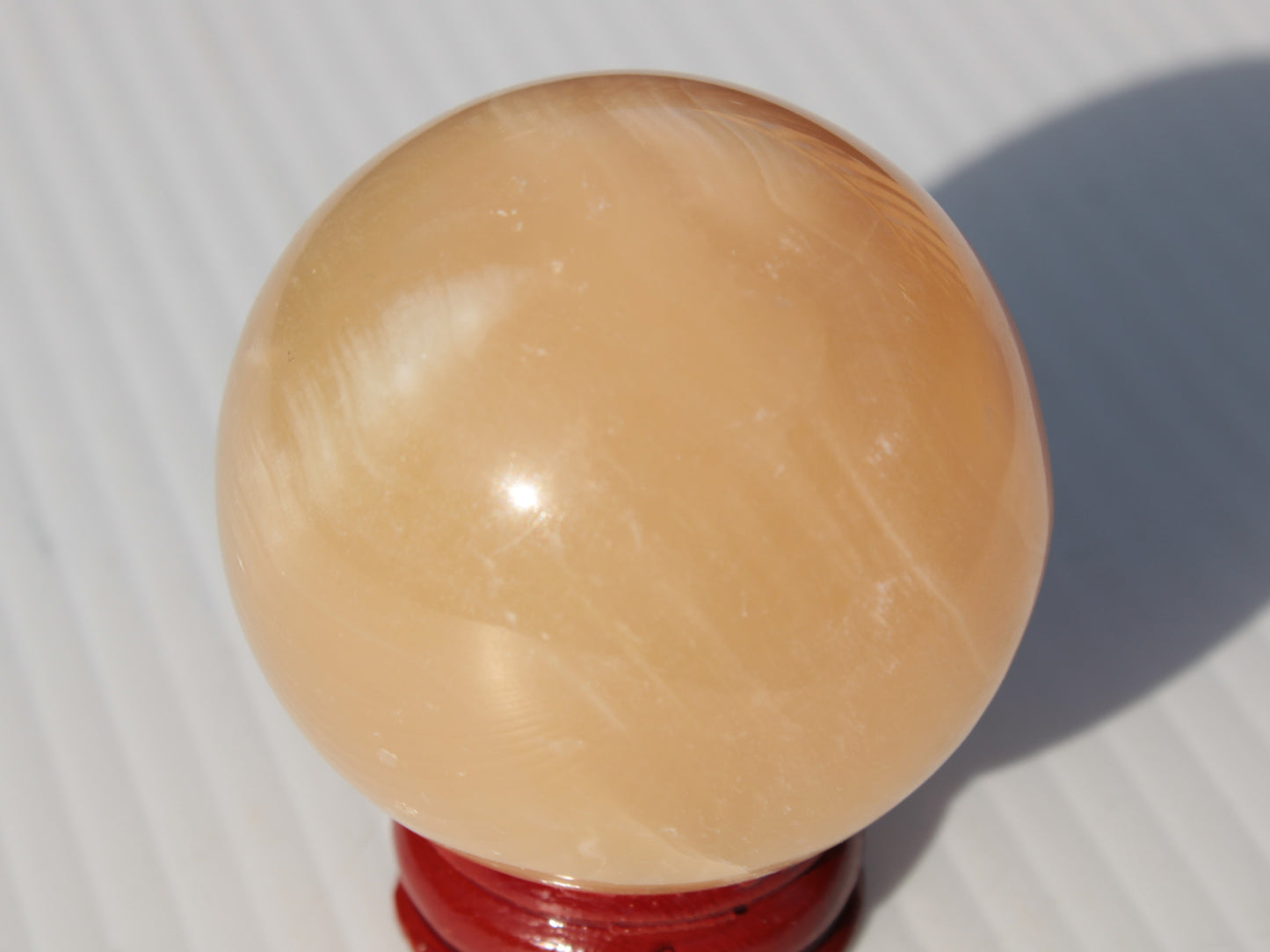 Honey Calcite sphere 49mm 167g Rocks and Things